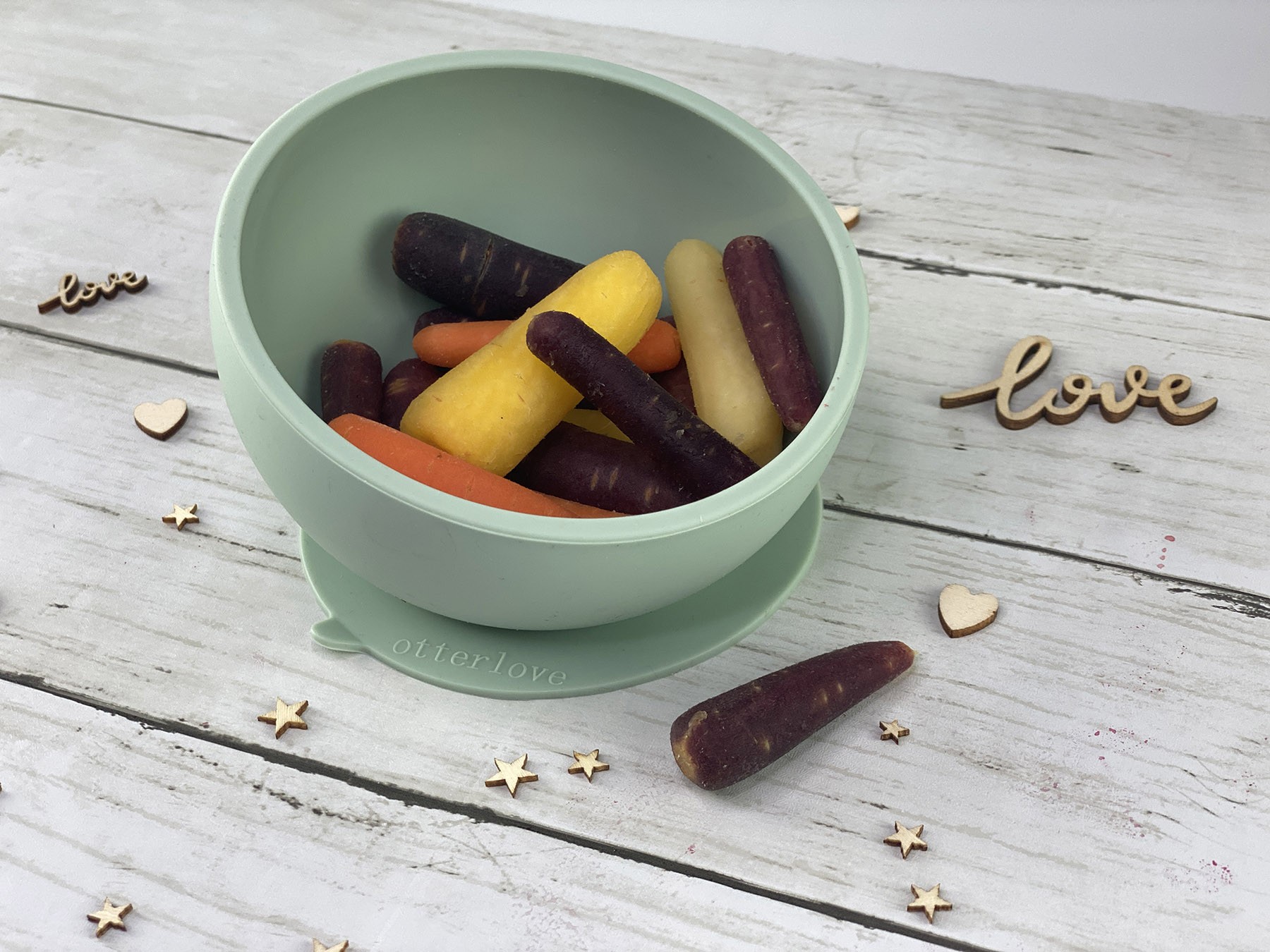 ergonomic silicone baby feeding bowl with suction base - sage - healthy toddler snacks - carrots