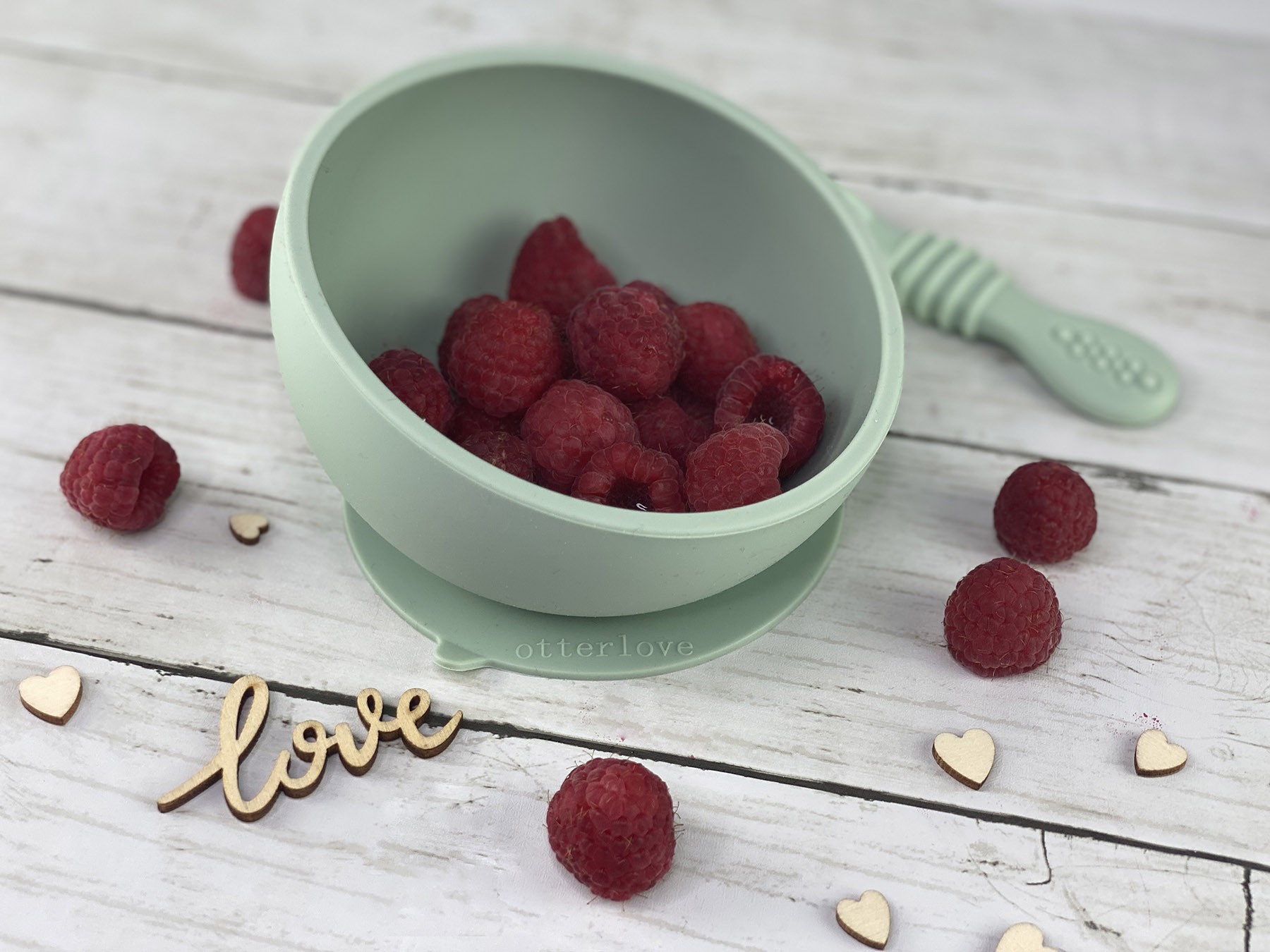 ergonomic silicone baby feeding bowl with suction base - sage - healthy toddler snacks - raspberries