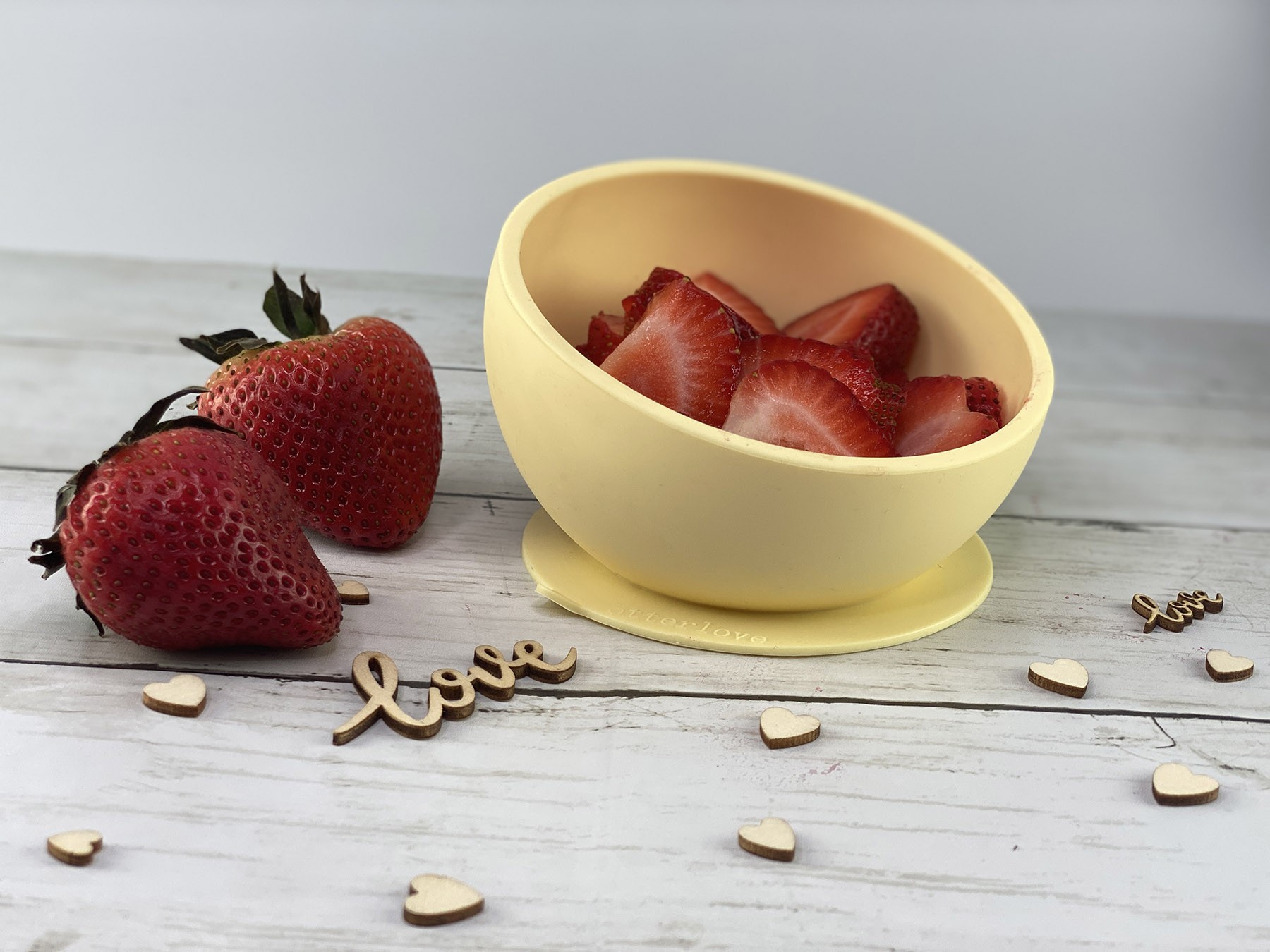 ergonomic silicone baby feeding bowl with suction base - sunshine - healthy toddler snacks - strawberries