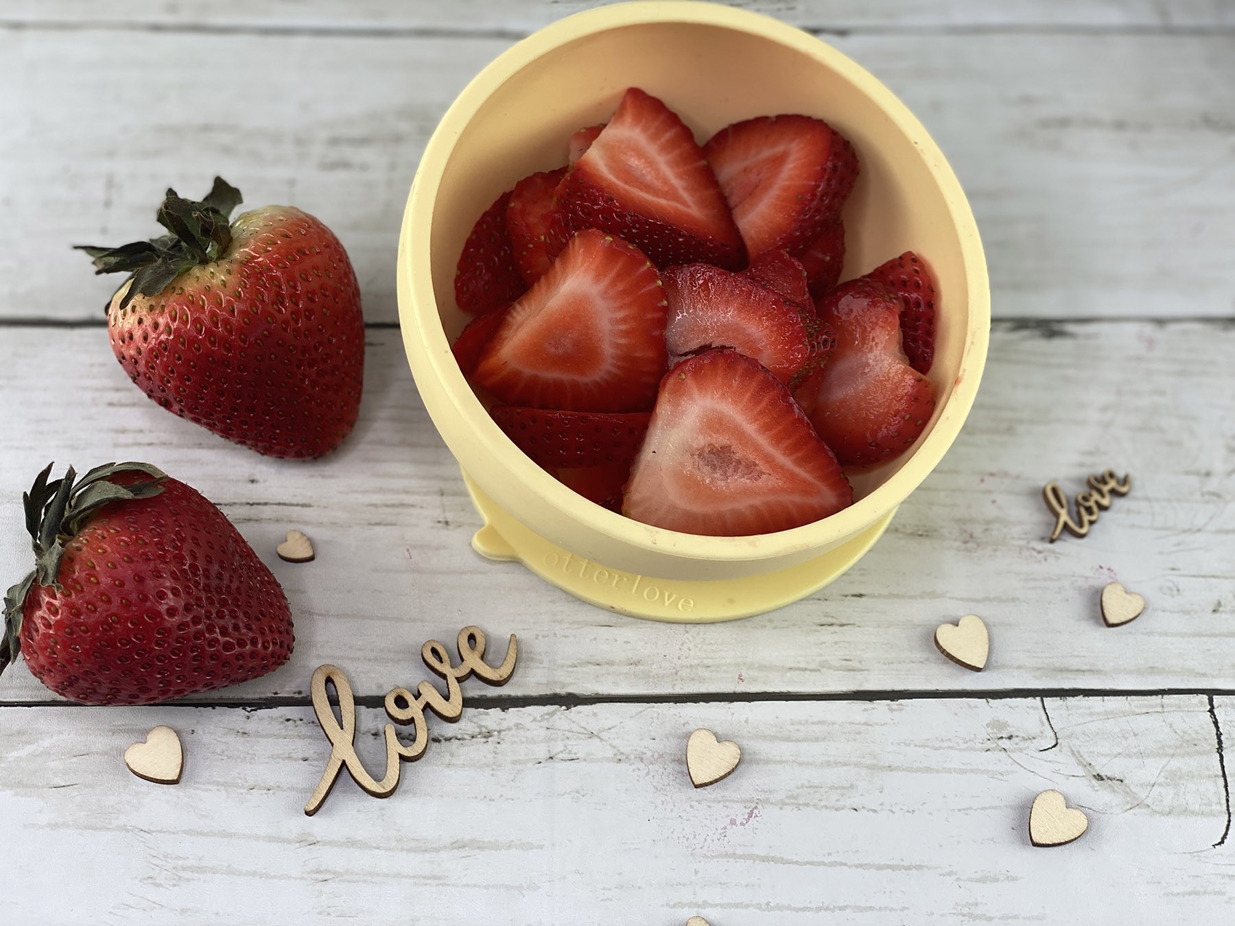 ergonomic silicone baby feeding bowl with suction base - sunshine - healthy toddler snacks - strawberries