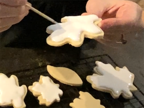 painting cookies with royal icing